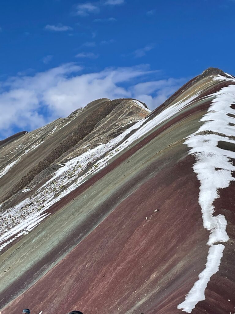 Snowy image of Rainbow Mountain Peru